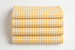 Yellow Gingham Cotton — Folded stack view