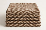 Zebra Trail Canvas — Folded stack view