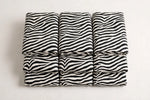 Zebra Tuxedo Cotton — Folded stack view